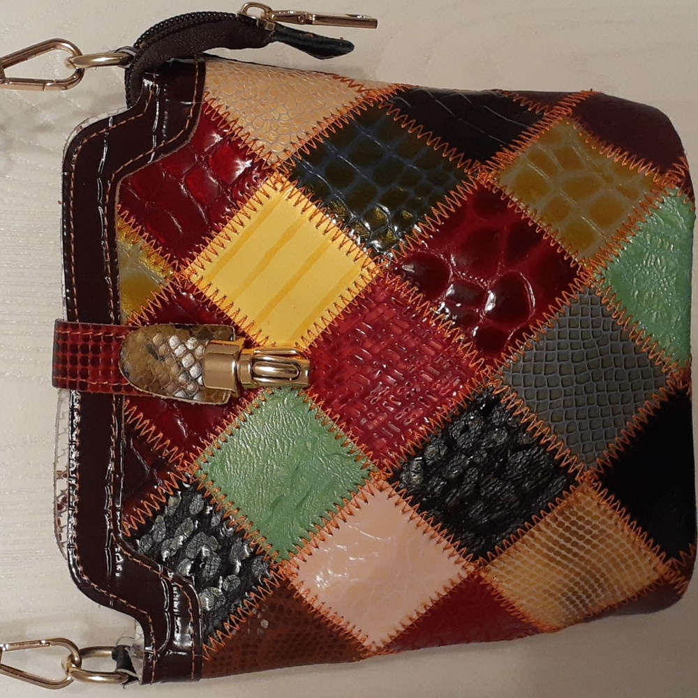 Multi colored leather crossbody handbag.